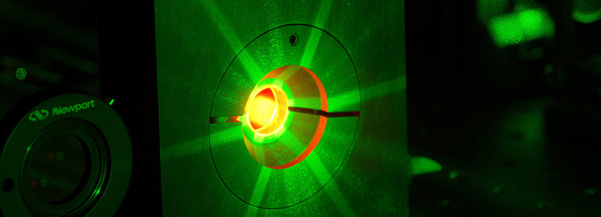 Generation of ultra-high intensity laser pulses, laser-based particle acceleration Picture of the ATLAS Ti:Sapphire amplifier crystal