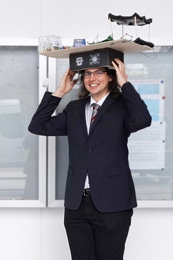 Sebastian Reiter with his graduation hat